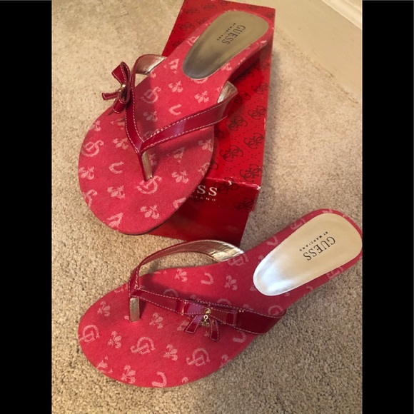 red guess flip flops